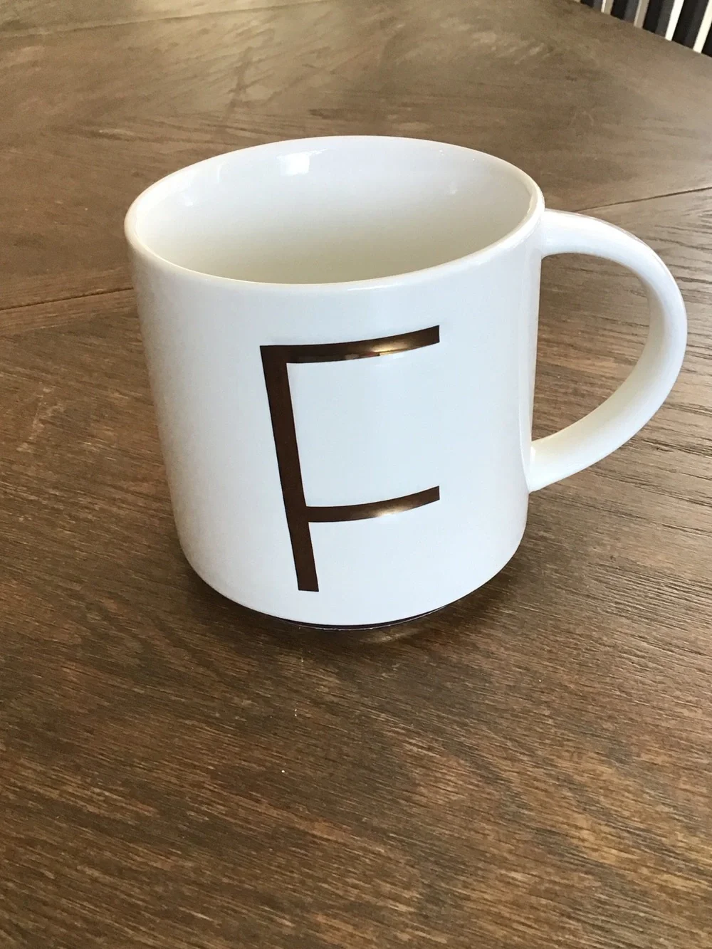Williams Sonoma white ceramic mug features a gold-painted initial 